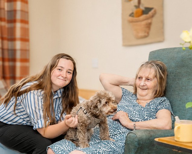 A resident enjoying companionship during a short stay at Dove Court